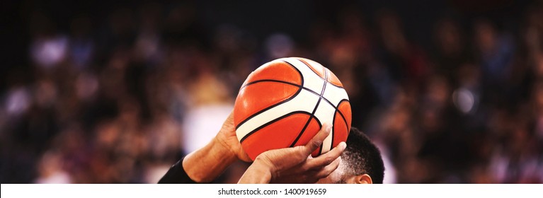 Basketball Player Shooting Three Pointer During Game