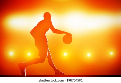 Basketball player silhouette dribbling with ball on red background with action lights - Powered by Shutterstock