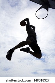 Basketball Player Slam Dunk Silhouette