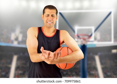 Basketball Player With A Wrist Injury At Stadium