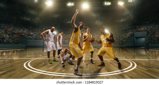 Basketball Players Emotionally Rejoice At Victory On Professional Basketball Stadium. Players From Opposing Teams Are Sad Because Of The Defeat