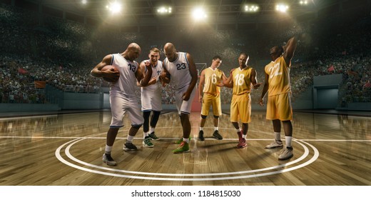 Basketball Players Emotionally Rejoice At Victory On Professional Basketball Stadium. Players From Opposing Teams Are Sad Because Of The Defeat