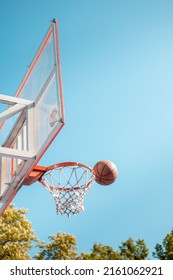 Basketball Rim Ball In Net Close Up