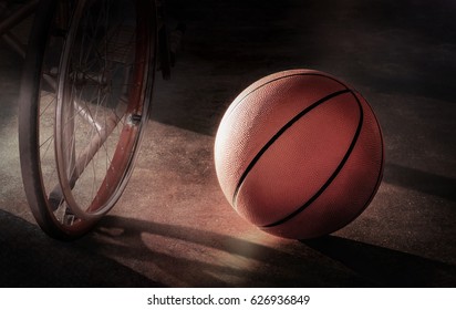 Basketball And Wheel Chair In A Lonely Atmosphere, In Concept Disappointment, Injury, Discouragement, Despair