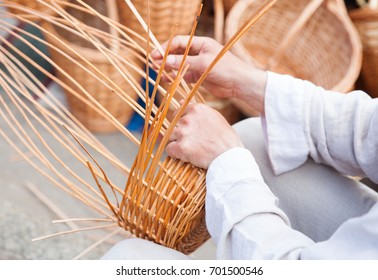 Basket-maker creates a new basket  - Shutterstock ID 701500546