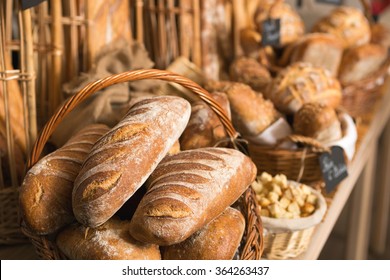 Baskets Of Bread On A Shelf, In A Bakery Store