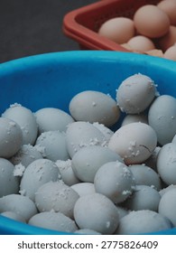 Baskets filled with various colored eggs