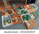 Baskets formation belongs to streetside market fruit vendor consist of variety tropical fruits