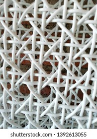 The Basketwork geometric pattern is a smooth texture with a background of repeated straight lines