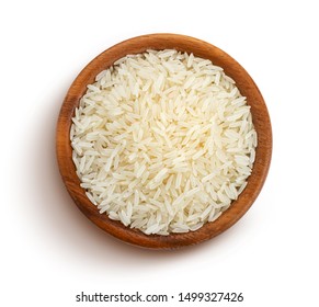 Basmati rice groats in a wooden bowl isolated on white background with clipping path, top view - Shutterstock ID 1499327426