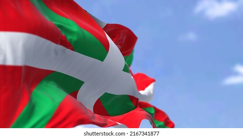 The Basque Country flag waving in the wind on a clear day. The Basque Country is an autonomous community in northern Spain
