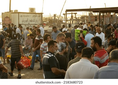 Basra, Iraq - July 11, 2022: Photo Of Arabian People In The Traditional Fish Market