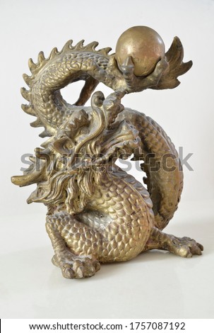 Bass Dragon Statue, Isolated on White Background.