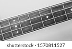 bass guitar neck closeup with copy space . black and white                              