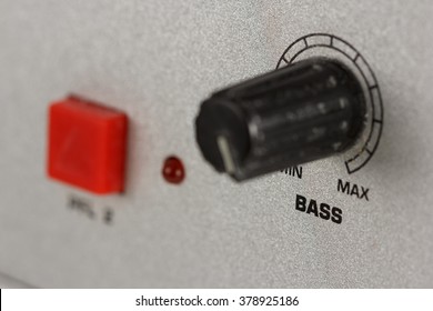 Bass Knob Of A DJ Mixer At Maximum With Metal Surface