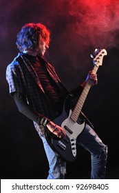 A Bassist Plays At A Live Concert