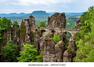 Bastei Bridge and Mesa Lilienstein, Saxon Switzerland, Saxony, Germany, Europe.
Mesa Lilienstein in the background.  - Powered by Shutterstock