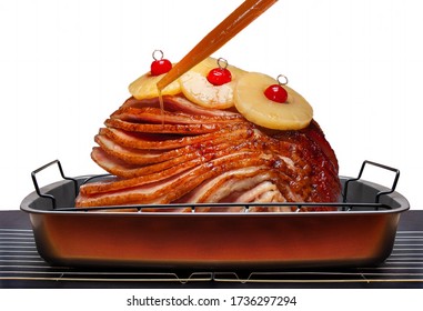 Basting Holiday Spiral Sliced Ham With Juices