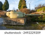 A Bastogne Battle of the Bulge Ardennes Offensive WW2 Sherman Tank Turret in Belgium and View of Town, Belgium