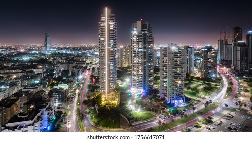 Bat Yam - Tel Aviv suburb, night aerial panorama. Modern skyscrapers