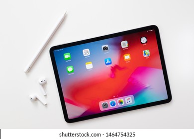 Bat Yam/Israel - July 29, 2019: IPad Pro 11 , AirPods And Apple Pencil On White Background.