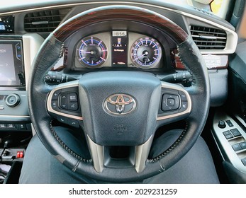 Batang Central Java Indonesian - August 23, 2021. Toyota Kijang Innova. Close Up Steering Wheel, Buttons, Odometer. Modern Car Interior