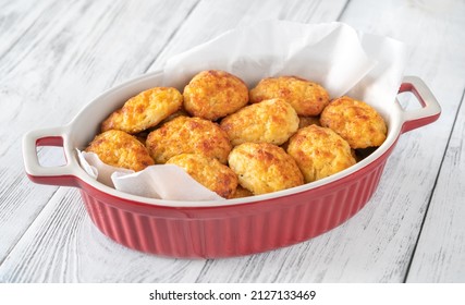 Batch of baked cheesy cauliflower tots close up - Shutterstock ID 2127133469