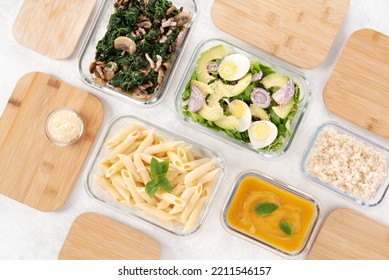 Batch cooking. Glass lunch boxes with bamboo lid. Meal preparation concept. Organization of meals. Healthy and fresh cuisine. Menu of the week. Starter, main course and dessert. Healthy nutrition. - Shutterstock ID 2211546157
