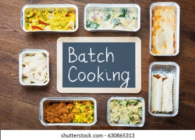 Batch Cooking Text Written On Slate With Take Away Dishes In Foil Container On Table - Shutterstock ID 630865313