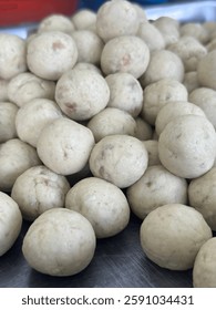 Batch of meatballs ready to served after checking quality