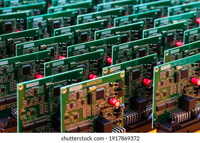 Batch of Produced Automotive Printed Circuit Boards with Surface Mounted Components - Shutterstock ID 1917869372