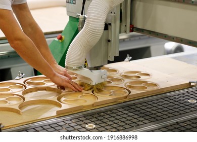 Batch Production Process With CNC Wood Router Machine. Selective Focus.