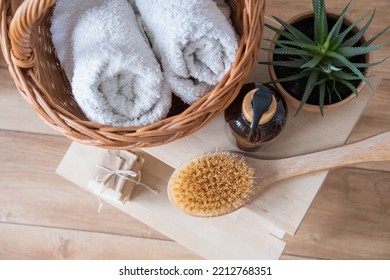 Bath Accessories On A Wooden Bench Top View.