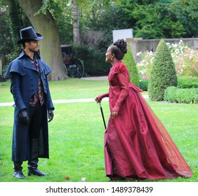 Bath, Bath And North East Somerset / United Kingdom - 27th August 2019: Regé-Jean Page And Adjoa Andoh In A Filming For The Netflix Series Bridgerton, Using The Holburne Museum As The Set