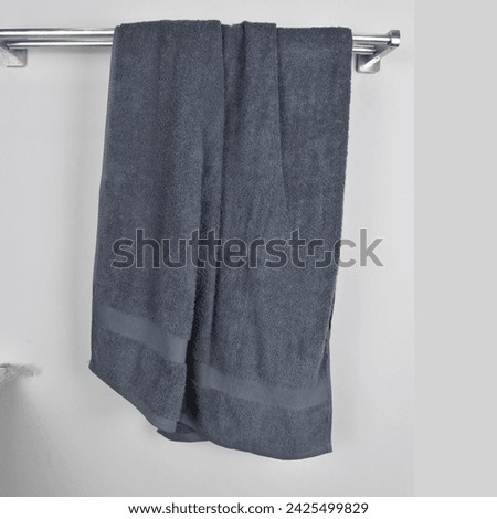 Bath towel hanging in bathroom wall with simple and catchy image for your product Stock photo © 