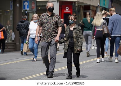 Bath, UK - July 24, 2020: Shoppers Wear Face Masks As A New Law Is Introduced Mandating The Use Of Masks In Shops. The Wearing Of Face Masks Is To Combat The Covid-19 Pandemic. 