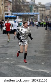 BATH, UK - MARCH 6, 2011: Male Competitor Warms Up Before The Start Of The 2011 Bath Half Marathon.