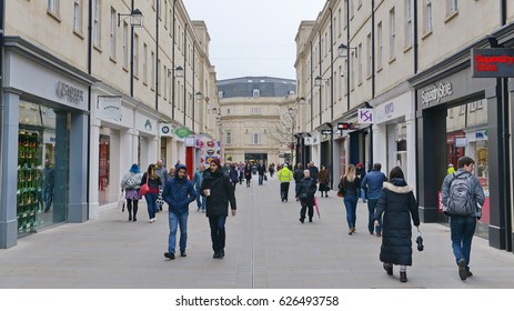 Bath, UK - March 6, 2017: People Walk Along A Busy Street In Southgate Shopping District. The Landmark Somerset City Of Bath Has UNESCO World Heritage Status Receiving Over 4 Million Visitors A Year.