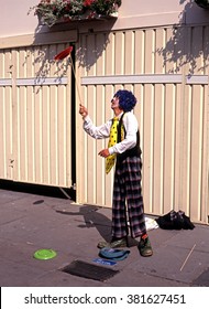 BATH, UNITED KINGDOM - AUGUST 14, 1991 - Plate Spinner Performing In The Street, Bath, Avon, England, UK, Western Europe, August 14, 1991.