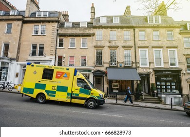 BATH, UNITED KINGDOM - MAR 7, 2017: Yellow British UK Ambulance Nhs Ambulance, South Western Ambulance Service Fast Motion In Bath, United Kingdom