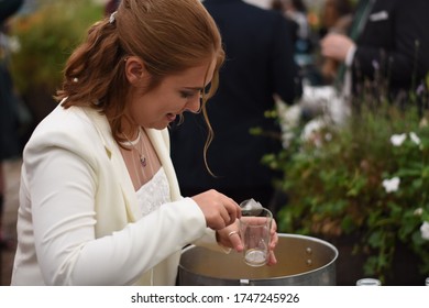 BATH, UNITED KINGDOM - Oct 24, 2016: The bride takes a moment  during this autumn wedding in Bath, Somerset, England. October 24, 2016.