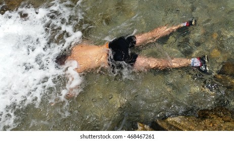 bath in the waterfall