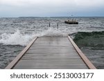 Bathing jetty in windy weather Vastanvik Motala Sweden