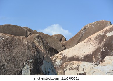 Batholith Rocks Along The Coastline Of A Tropical Caribbean Island