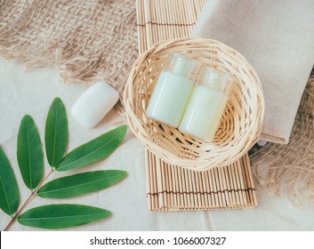 Bathroom accessories. Shower gel, body lotion, soap on basket for the bath.