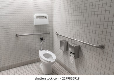 Bathroom Designed To Allow Access By People With Various Forms Of Disability To Safely Use Public Restroom In Compliance With ADA Americans With Disabilities Act