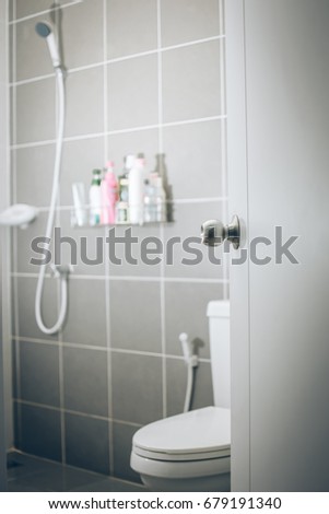The bathroom at the door is open.