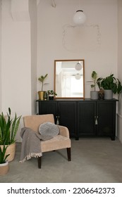 Bathroom Interior With Black Chest Of Drawers