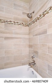 Bathroom Interior Design. View Of Open Shower With Tile Wall Trim. Northwest, USA