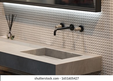 Bathroom Interior Grey Marble Sink And Black Tap. Beautiful Modern Bathroom Design.